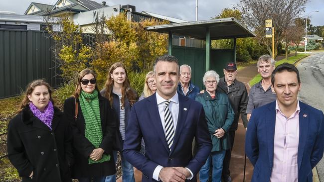 Opposition Leader Peter Malinauskas with commuters who say they are set to lose their suburban bus services under the reforms. Picture: Roy Van Der Vegt