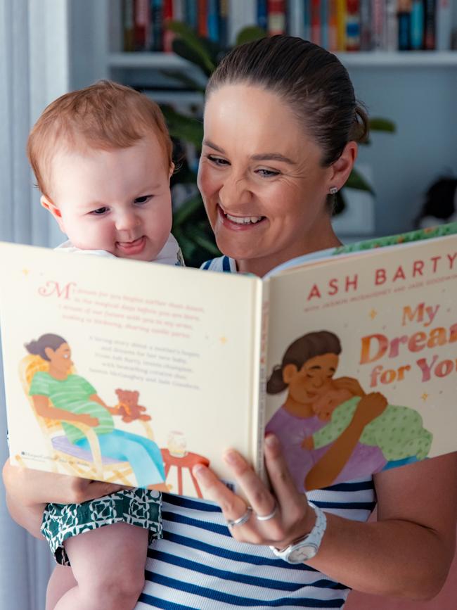 Ash reading one of her books to Hayden.