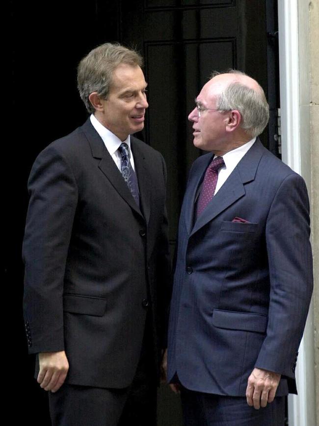 With former prime minister John Howard in 2002: ‘I found him a really upright, strong, decent person to deal with,’ says Blair.