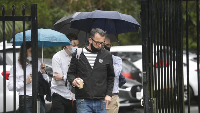 Theo Hayez' father Laurent Hayez (centre) and other loved ones outside court for the inquest into the Belgian backpacker's disappearance in Byron Bay. Picture: Liana Boss