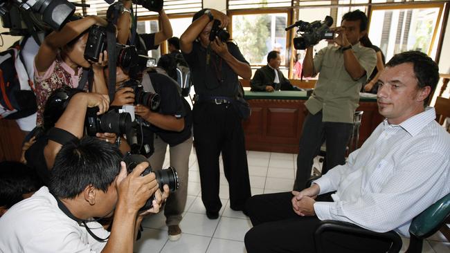 Nick Taylor is confronted by Bali media at his drugs trial in 2007.