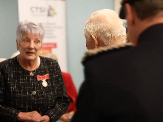 King wears kilt on visit to homelessness charity in Scotland