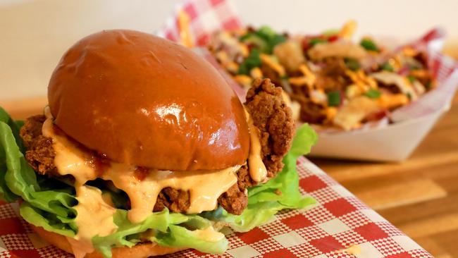 The fried chicken Mare Burger ($14) and Abodo loaded fries ($12).