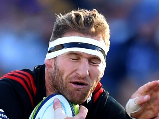 Kieran Reas of the Crusaders (centre) is tackled by Sam Carter of the Brumbies (left) during the Round 9 Super Rugby match between the ACT Brumbies and the Crusaders at GIO Stadium in Canberra, Sunday, April 24, 2016. (AAP Image/Lukas Coch) NO ARCHIVING, EDITORIAL USE ONLY