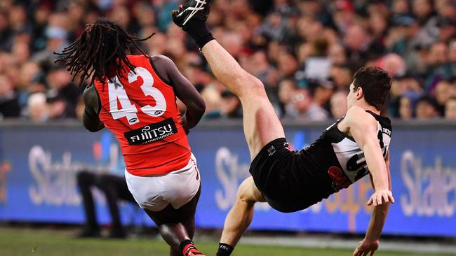 Anthony McDonald-Tipungwuti bumps Darcy Byrne-Jones.