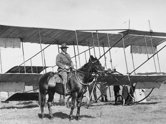 Colonel Granville Ryrie mounted on his horse Plain Bill in front of a Bristol boxkite. Picture: Australian War Memorial