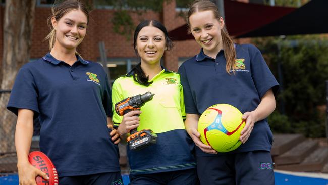 Scarlett, 16, Charlotte, 16 and Orlu, 16 are part of Parade College’s new VET program. Picture: Jason Edwards