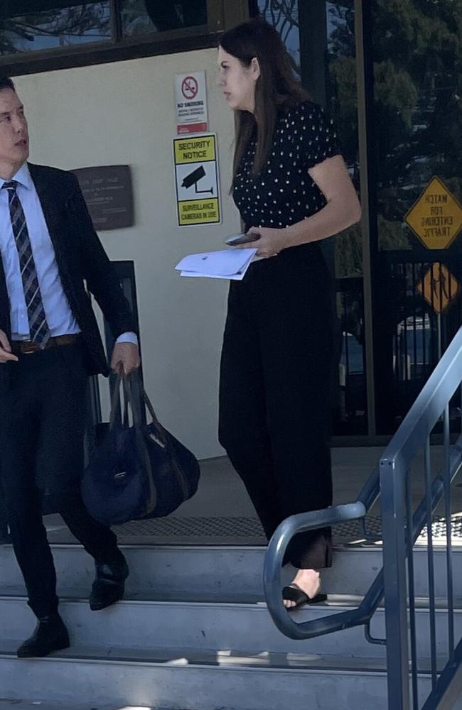 Alana Candice Guttridge (right) and her lawyer Alan Phillips (left) leaving the Redcliffe Magistrates Court on May 17.