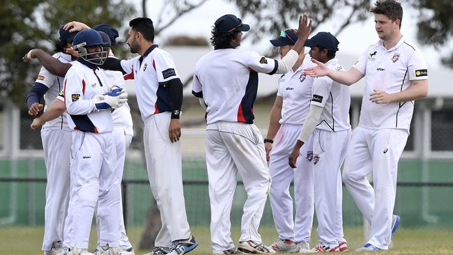 Diggers Rest Bulla players celebrate a wicket. Picture: Andy Brownbill