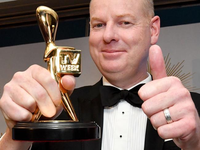 Tom Gleeson poses for a photograph after winning the Gold Logie for most popular personality on Australian TV during the 2019 Logie Awards at The Star Casino on the Gold Coast, Sunday, June 30, 2019. (AAP Image/Darren England) NO ARCHIVING, EDITORIAL USE ONLY