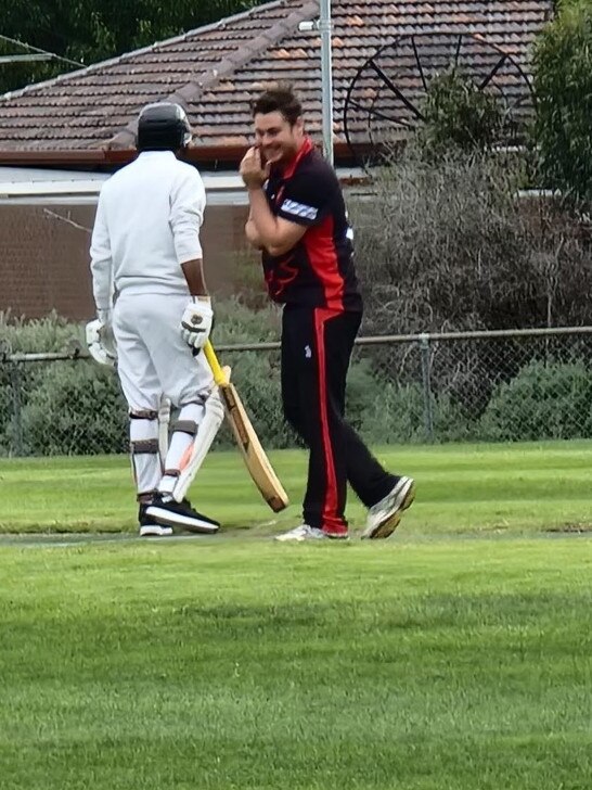 Marcus Murphy has a laugh with a Darebin Chargers batter on Saturday.