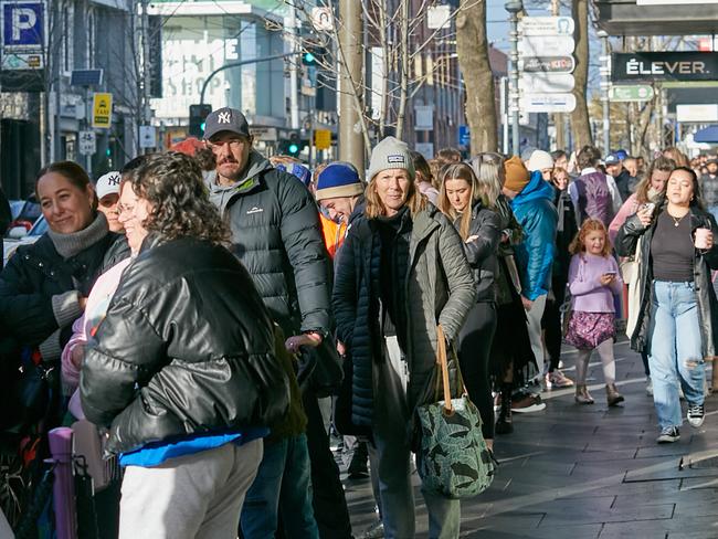 Hundreds of people queued up along Chapel Street to get access to the Velocity 1 Point Rewards store. Picture: Supplied