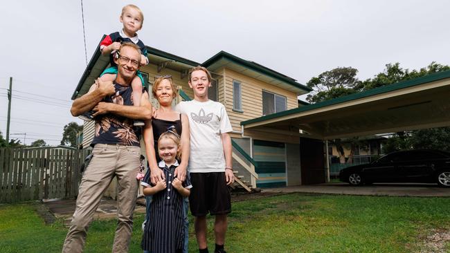 New home buyers Robert and Jacinta Orth with their kids Hamish 3, Mckenzie 5, and Lucus 21, with their new home at Caboolture. Picture Lachie Millard
