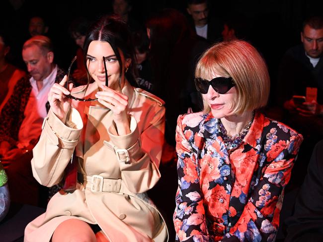 Vogue Editor-in-Chief Anna Wintour cracks a rare smile next to model Kendall Jenner as they attend the Gucci fashion show during Milan Fashion Week SS24. Picture: Gabriel Bouys/AFP