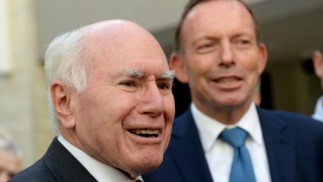 Former Liberal prime ministers John Howard and Tony Abbott. Picture: AAP