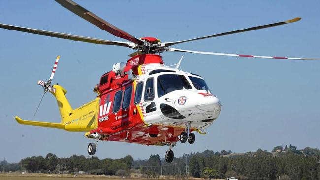 Westpac Lifesaver Rescue Helicopter were tasked to Tyalgum to assist. Picture: Marc Stapelberg