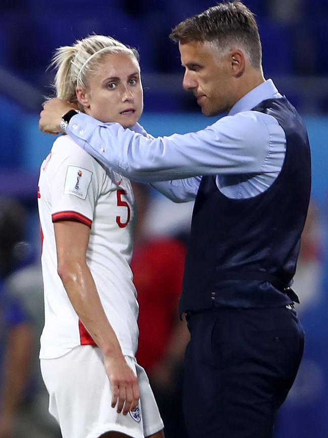 England coach Phil Neville consoles Steph Houghton. Picture: Getty Images