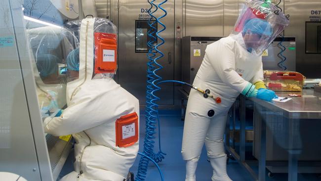 Workers inside the P4 laboratory in Wuhan. “I don’t think we will ever know” what happened, said a western intelligence source. Picture: AFP