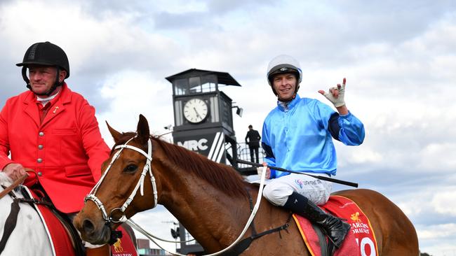 Michael Dee riding Durston after winning Race 9, the Carlton Draught Caulfield Cup, during Caulfield Cup Day at Caulfield Racecourse on October 15, 2022 in Melbourne, Australia. (Photo by Vince Caligiuri/Getty Images)