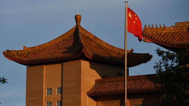 A Chinese flag flies at the Embassy of the People's Republic of China in Canberra. Picture: Getty Images