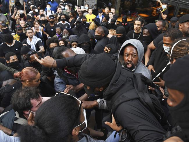 Protesters gather outside the Royal Festival Hall in central London. Picture: PA via AP