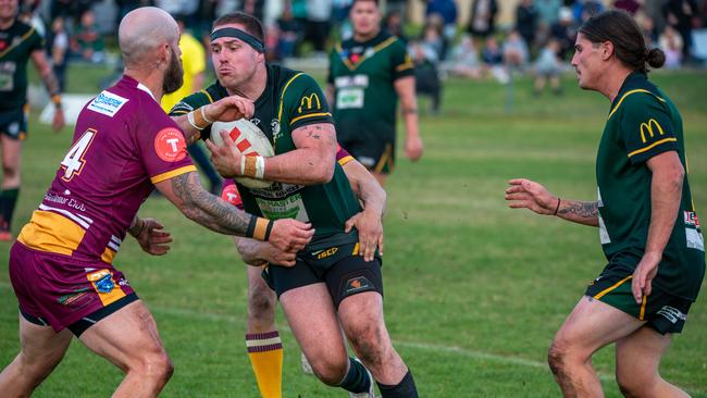 Stingrays captain/coach Tommy Warner taking a charge in the last derby. Picture: Thomas Lisson