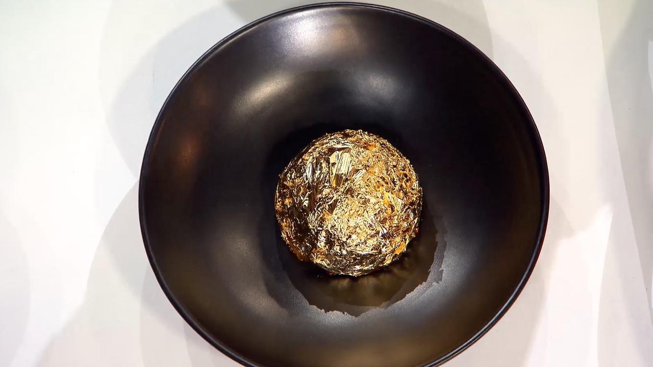 The 'golden crackle' is a brand new dessert at Peter Gilmore's restaurant Bennelong. Picture: Channel 10