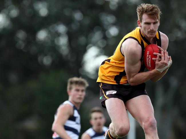 Chris Jones takes a mark for Box Hill Hawks during his time in the VFL. Picture: Mark Dadswell