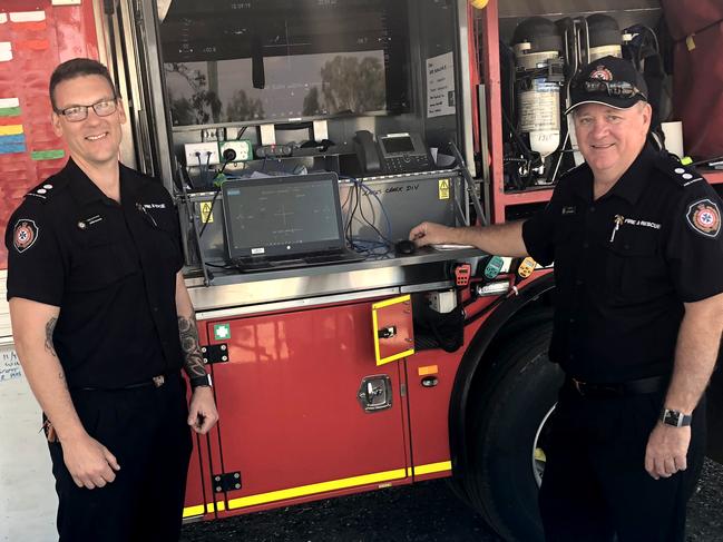Acting Station Officer Jared Glover and Station Officer Barry Thompson at the staging area on Lakes Creek Road