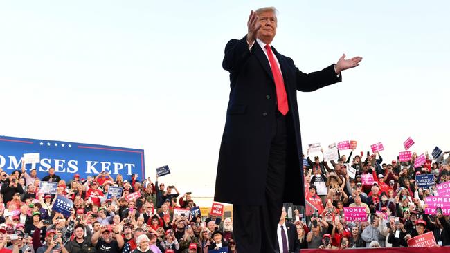 US President Donald Trump arrives to speak during an election rally in Murphysboro, Illinois on Saturday. Picture: AFP