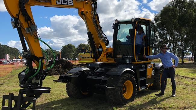 At Casino Primex on May 20, 2021, Chris Brookner of Northern Rivers Property Services gives a hydra digger the paddock test under the eagle eye of JCB Construction Equipment Australia's Territory Manager, Chris Kane. Photo: Alison Paterson