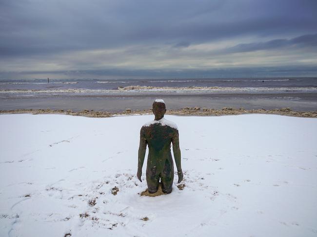 Snow covers the beach and a statue at Antony Gormley’s art installation ‘Another Place’ at Crosby Beach on February 27, 2018 in Liverpool, United Kingdom. Freezing weather conditions dubbed the “Beast from the East” brings snow and sub-zero temperatures to the UK. Picture: Getty Images