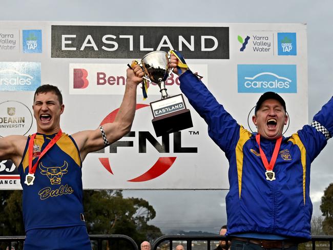 Noble Park captain Kyle Martin and coach Steve Hughes celebrate after winning the EFL Premier Division Grand Final between Rowville and Noble Park in Melbourne, Saturday, Sept. 17, 2022. Picture: Andy Brownbill