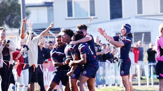 LANGER trophy schoolboy rugby league grand final between Palm Beach Currumbin SHS and Ipswich SHS. Ipswich SHS player Josiah Pahulu celebrates with teammates after a try. Picture: NIGEL HALLETT