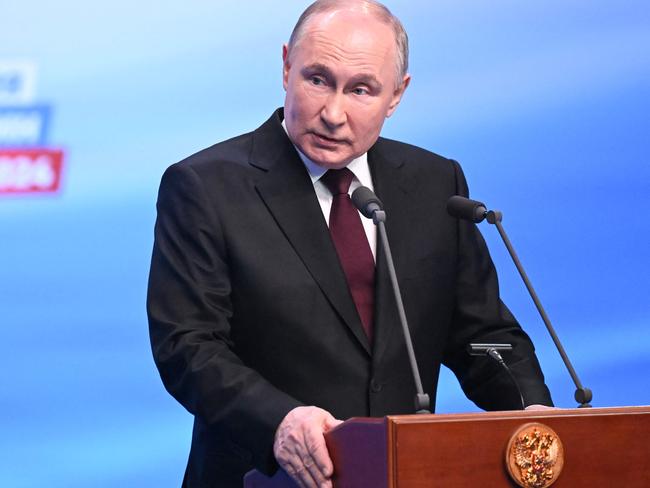 Vladimir Putin addresses the media at his campaign headquarters in Moscow. Picture: AFP