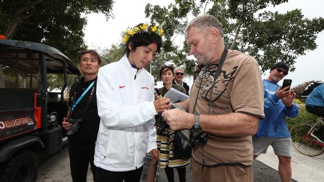 Japan's Yuta Shitara signing autographs. Photograph: Jason O'Brien