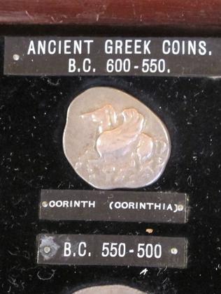 Silver Greek coins from 600BC ... Lay undiscovered for 80 years in an archives tray at the University at Buffalo, a campus at State University of New York. Picture: AP / Carolyn Thompson