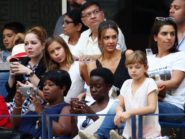 Jessica Alba, sits with her daughters, Honor Marie and Haven Garner and actress Danai Gurira is also seen in attendance at the Women’s Singles Final Match between Karolina Pliskova of the Czech Republic and Angelique Kerber of Germany on Day Thirteen of the 2016 US Open. Picture: AFP