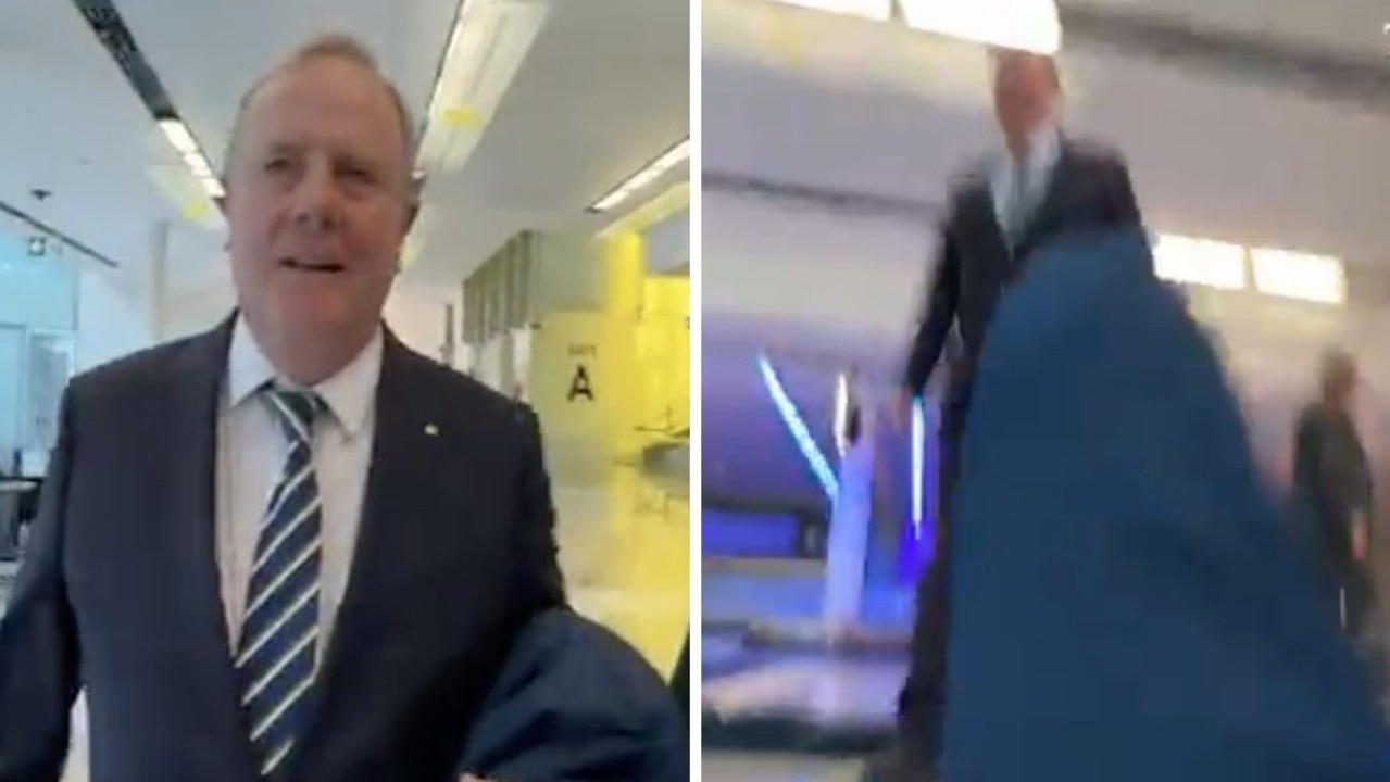 Peter Costello appeared to knock the reporter to the ground in the video. Picture: The Australian