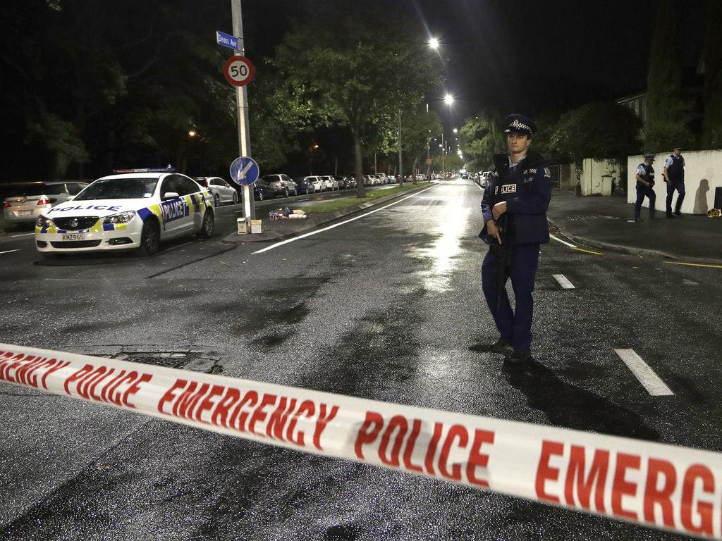 A police officer patrols at a cordon near a mosque in central Christchurch. Picture: AP