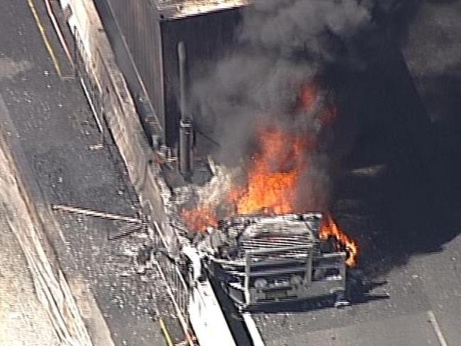 The truck in flames at Kingsgrove Road today. Picture: Seven News