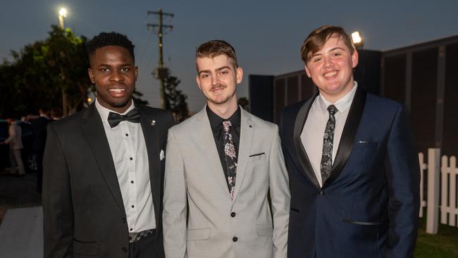 David Olakolu, Kye Notman and Tylee Smith at Mackay State High School formal 2022.Picture: Michaela Harlow