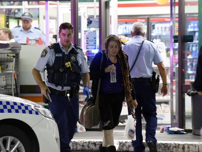 EXCLUSIVE PICTURES: Police rushed to the scene and cordoned off the area. Ms Hacker was led to an awaiting ambulance after being struck. Picture: Gordon McComiskie