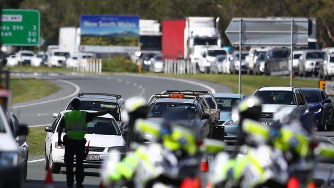 Police stopping vehicles at border checkpoint last year. (Photo by Chris Hyde/Getty Images)