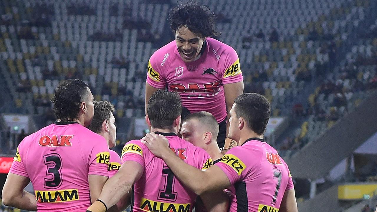 Jarome Luai and the Panthers celebrate a try in Townsville.