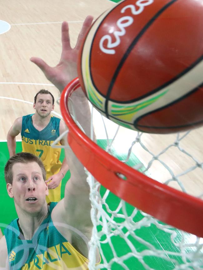 Australia's power forward Brock Motum jumps for the ball during a Men's quarterfinal basketball match between Australia and Lithuania at the Carioca Arena 1 in Rio de Janeiro on August 17, 2016 during the Rio 2016 Olympic Games. / AFP PHOTO / POOL / STRINGER