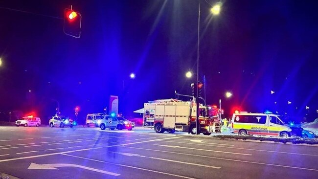 Emergency services as the scene of the crash. Photo: Jarod Voysey