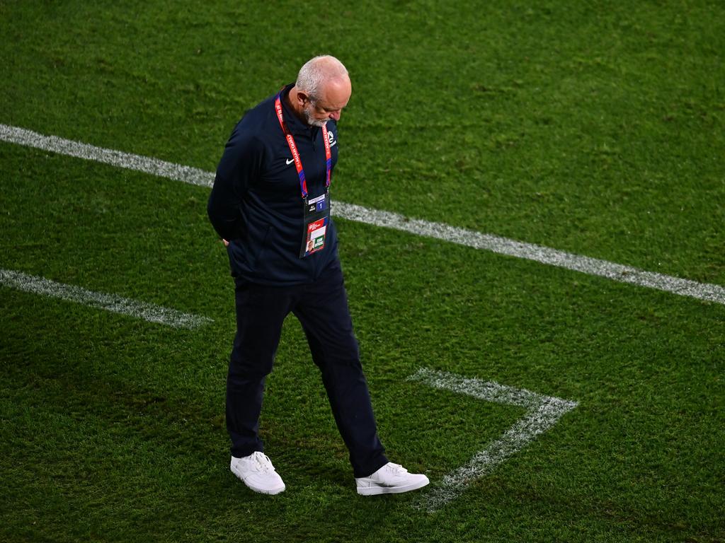 Graham Arnold looked downcast after Australia’s shock defeat to Bahrain on the Gold Coast a fortnight ago. Picture: Getty