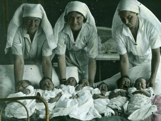 Birth of something big: Three AIM nurses proudly show off seven newborns they helped deliver in the 1940s. Picture: John Flynn