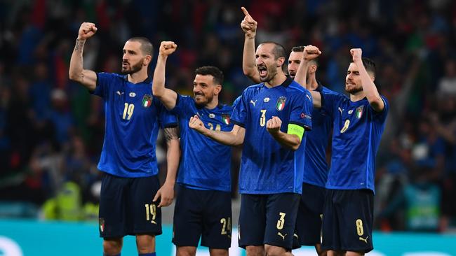 Leonardo Bonucci, Alessandro Florenzi, Giorgio Chiellini and Jorginho of Italy celebrate during the penalty shoot out during the UEFA Euro 2020 Championship Final between Italy and England at Wembley.